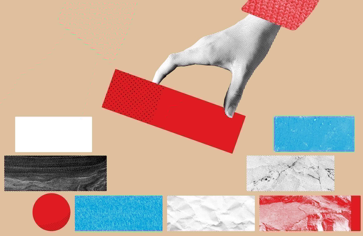 Hand placing building blocks